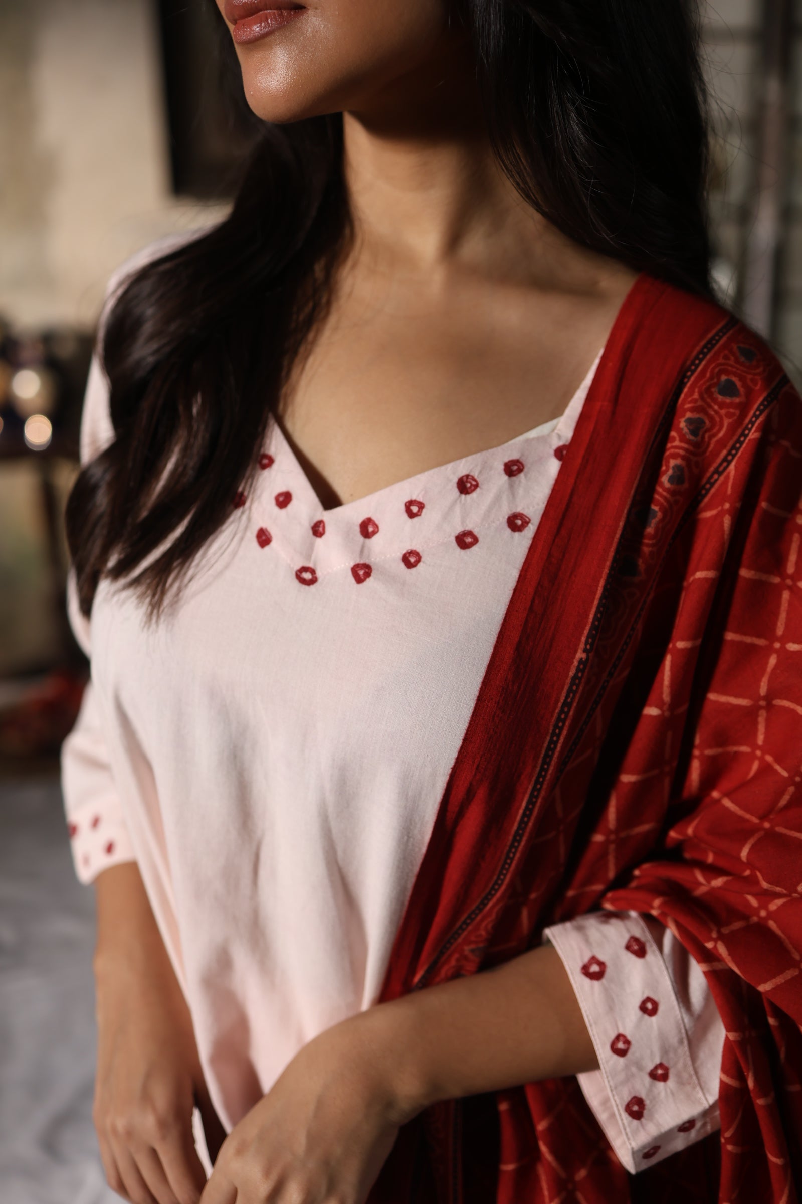 Raunaq-Creamish peach with Red (Cotton Ajrakh Bhandej)